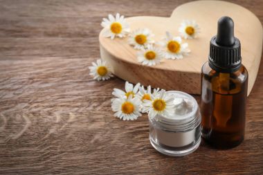 Papatya esans ve krema ile kompozisyon 