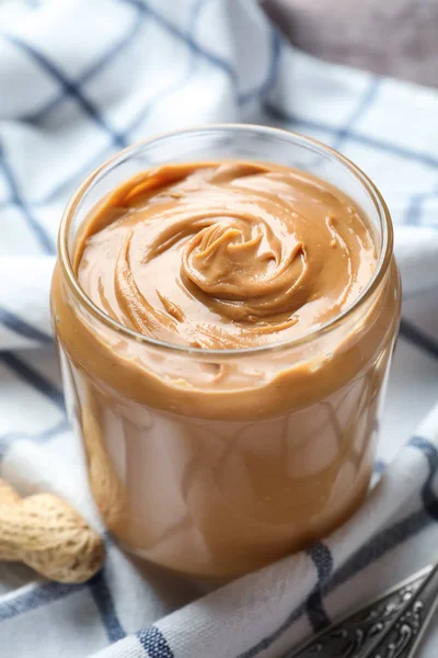 Jar with creamy peanut butter — Stock Photo, Image