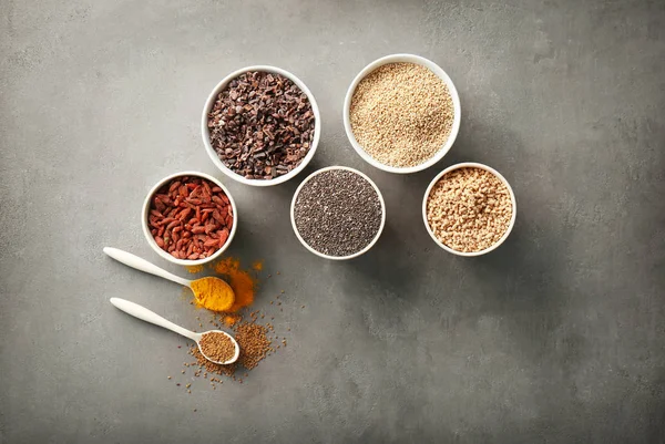 Superfood products in bowls — Stock Photo, Image