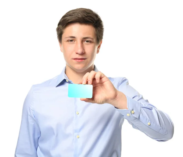 Cute teenage boy with card on white background — Stock Photo, Image