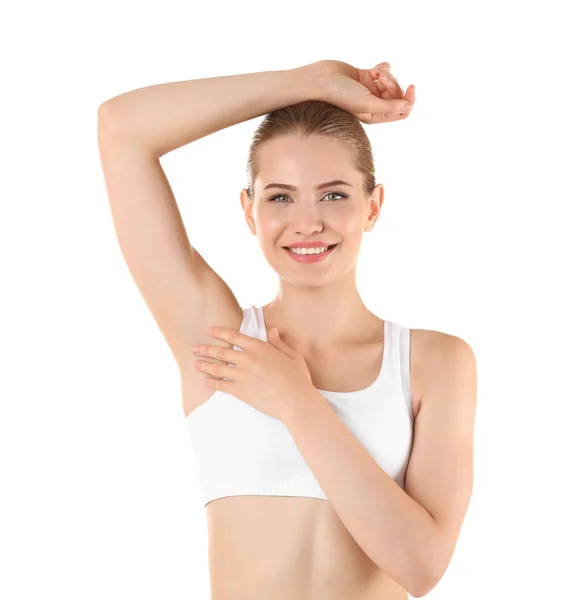 Young woman using deodorant — Stock Photo, Image