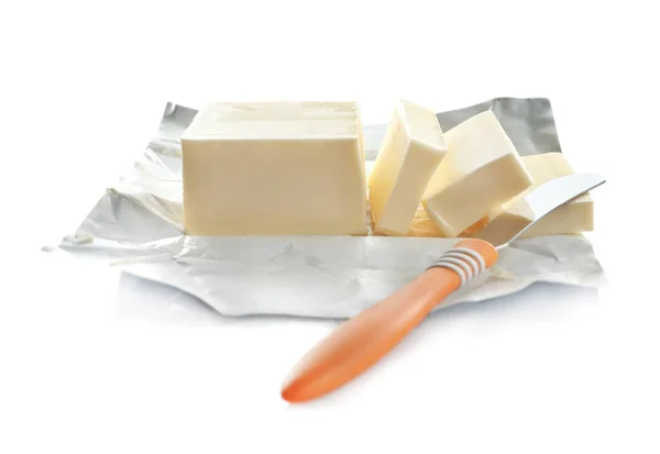 Pedazo de mantequilla con cuchillo —  Fotos de Stock