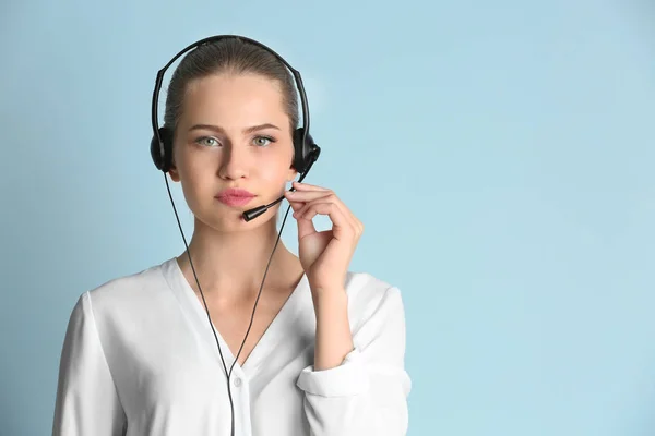 Beautiful young woman with headset — Stock Photo, Image