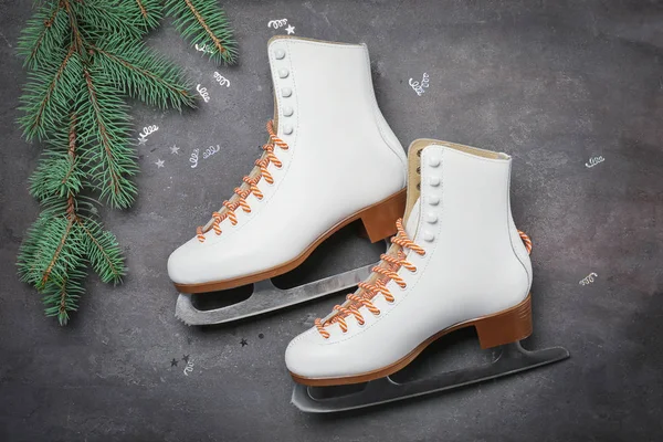 Figure skates with fir branch — Stock Photo, Image