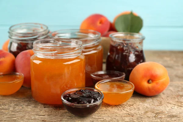 Apricot and berry jams in jars — Stock Photo, Image