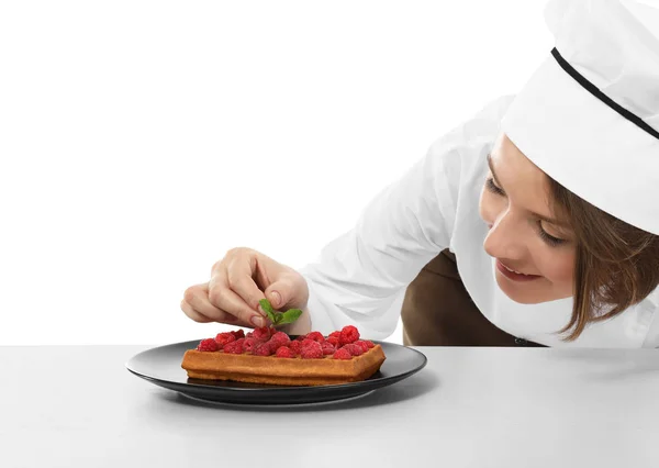 Female chef with tasty dessert — Stock Photo, Image