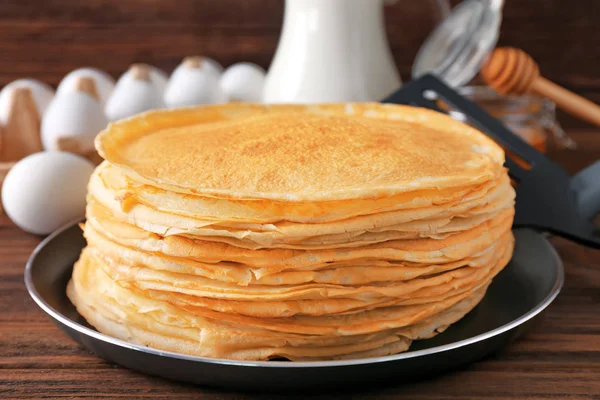 Stack of delicious thin pancakes — Stock Photo, Image