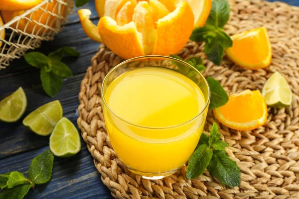 Glass with delicious orange juice — Stock Photo, Image