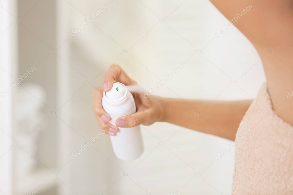 young woman with deodorant