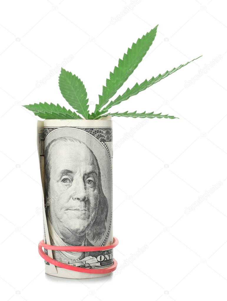 Green cannabis leaf and dollar 
