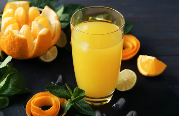 Glass with delicious orange juice — Stock Photo, Image