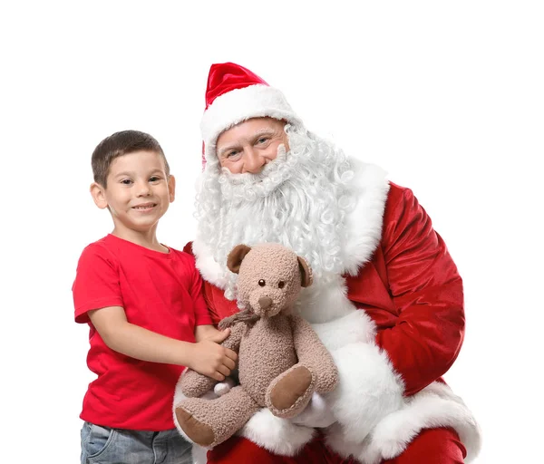 Cute boy and authentic Santa with teddy bear against white background — Stock Photo, Image
