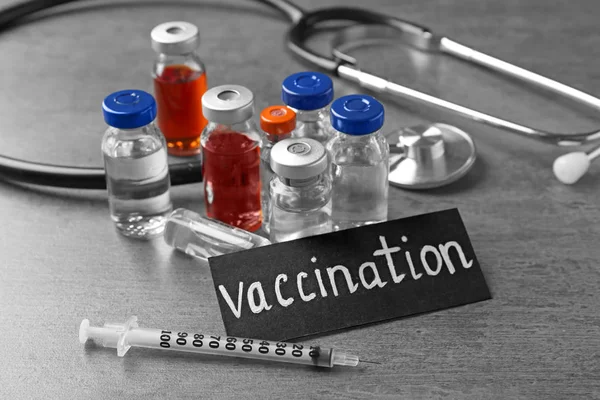 Scheda con la parola VACCINAZIONE — Foto Stock