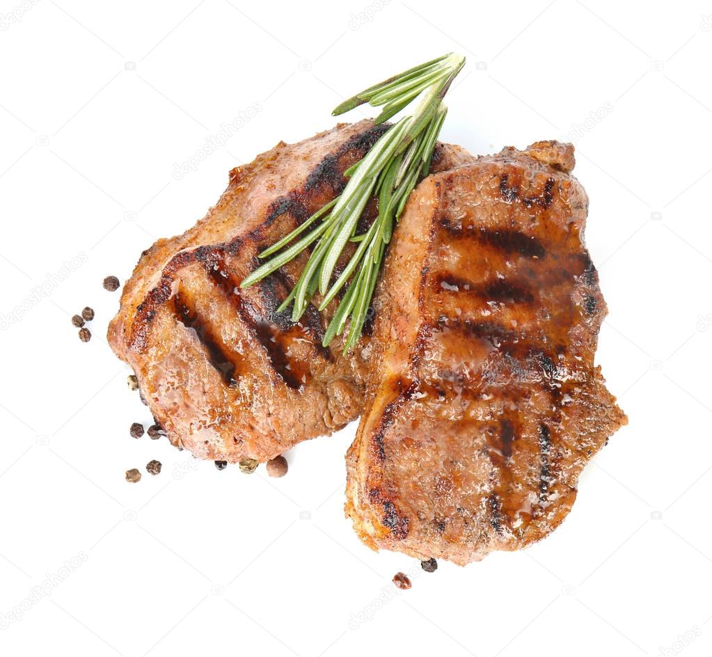 Tasty steaks with rosemary