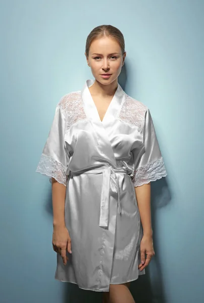 Woman after shower in silk bathrobe — Stock Photo, Image