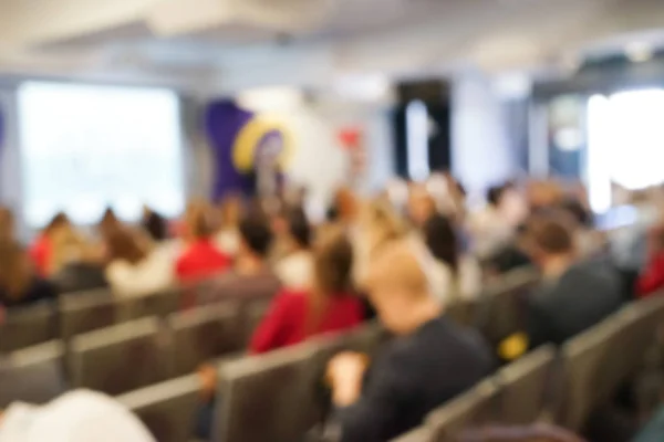 Blurred people in conference hall — Stock Photo, Image