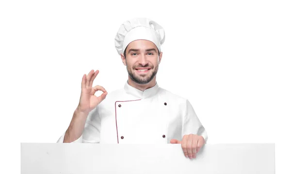 Jovem chef masculino com cartaz — Fotografia de Stock