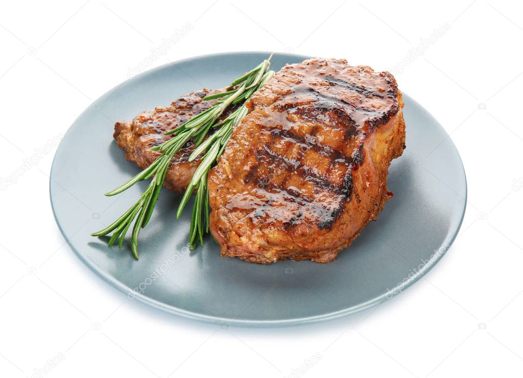 Plate with tasty steaks 