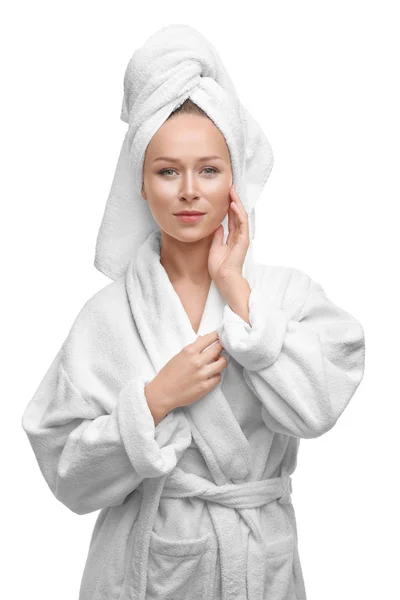 Beautiful young woman in bathrobe after shower on white background — Stock Photo, Image
