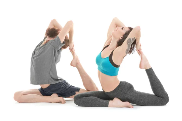 Couple practicing yoga — Stock Photo, Image