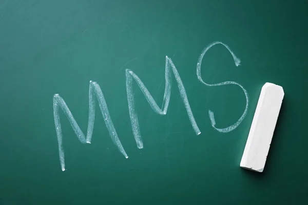 Abbreviation MMS written on chalk board — Stock Photo, Image