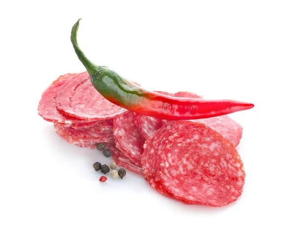 Delicious nakrájený párek s chilli pepř a koření na bílém pozadí — Stock fotografie