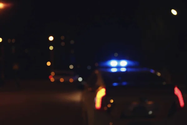 Voiture de police floue la nuit — Photo