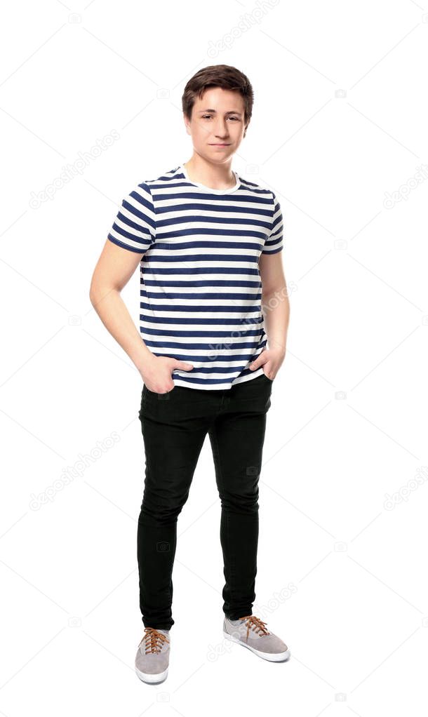 Cute teenager boy posing on white background