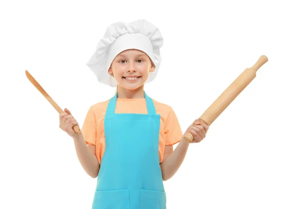 Linda chica en uniforme de chef sobre fondo blanco. Concepto de clases de cocina — Foto de Stock