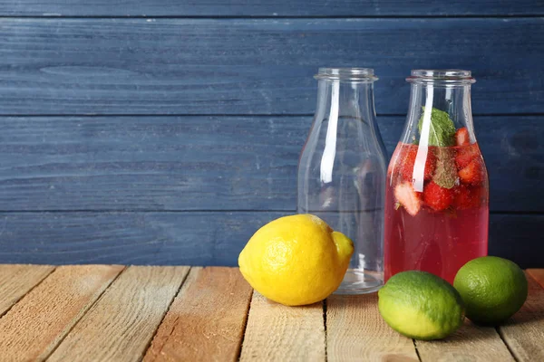 Bottles with strawberry lemonade
