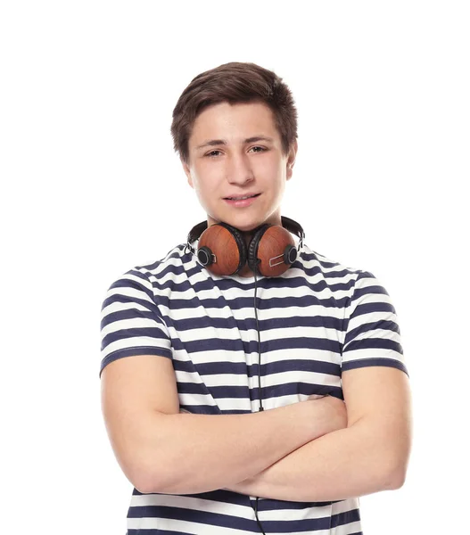 Lindo adolescente con auriculares sobre fondo blanco — Foto de Stock