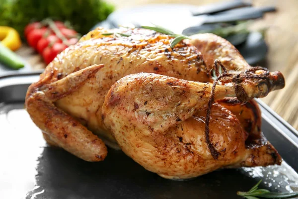 Delicious golden turkey on baking sheet — Stock Photo, Image