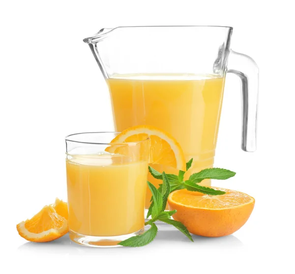 Composition with pitcher and glass of fresh orange juice on white background — Stock Photo, Image