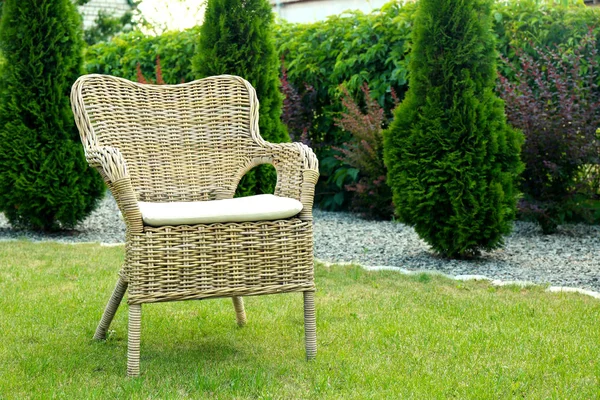 Comfortable chair on grass — Stock Photo, Image