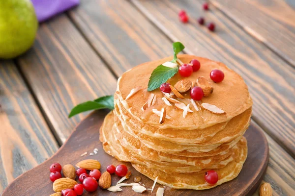 Delicious pancakes with nuts — Stock Photo, Image