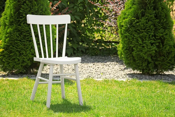 Comfortable chair on grass — Stock Photo, Image