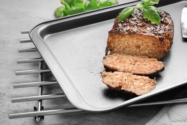 Tasty turkey meatloaf on baking tray — Stock Photo, Image