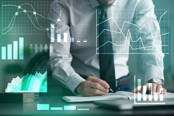 Man writing in notebook at table. Management concept — Stock Photo, Image