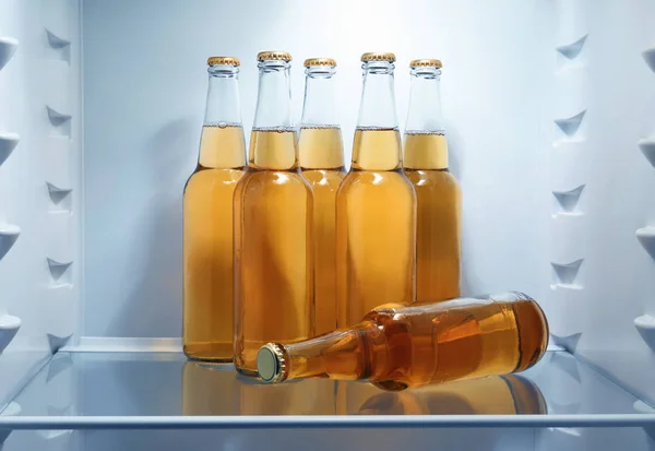 Bottles of lemonade in fridge — Stock Photo, Image