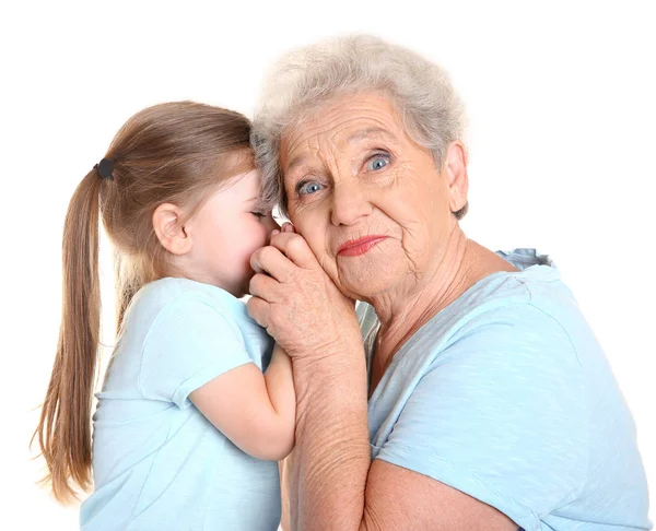 Schattig Klein Meisje Met Haar Grootmoeder Witte Achtergrond — Stockfoto