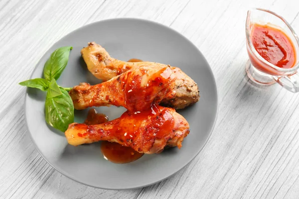 Chicken legs with sauce — Stock Photo, Image