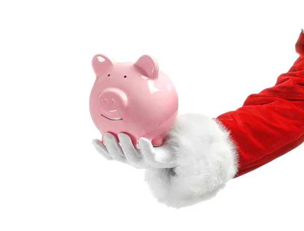 Santa Claus holding piggy bank on white background — Stock Photo, Image
