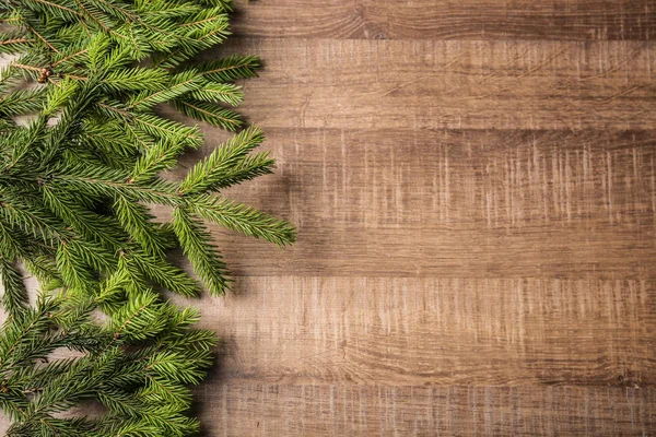 Köknar ahşap arka plan ağaç dallarında. Noel kavramı