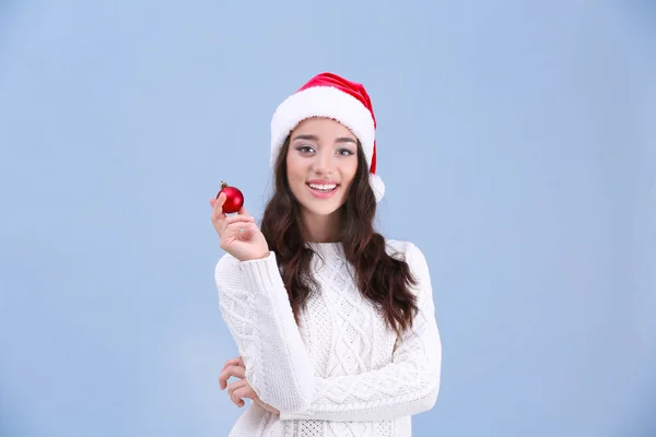 Pretty lady in Christmas hat — Stock Photo, Image