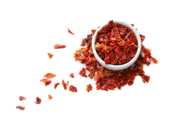 Piros chili pehely elszigetelt fehér kerámia tál — Stock Fotó