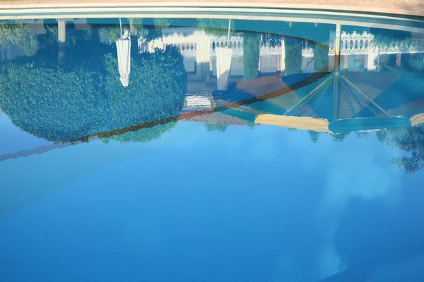 Modern swimming pool outdoors at resort — Stock Photo, Image