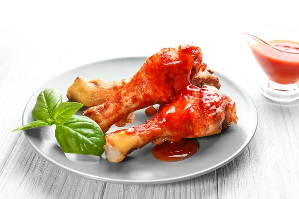 Chicken legs with sauce — Stock Photo, Image