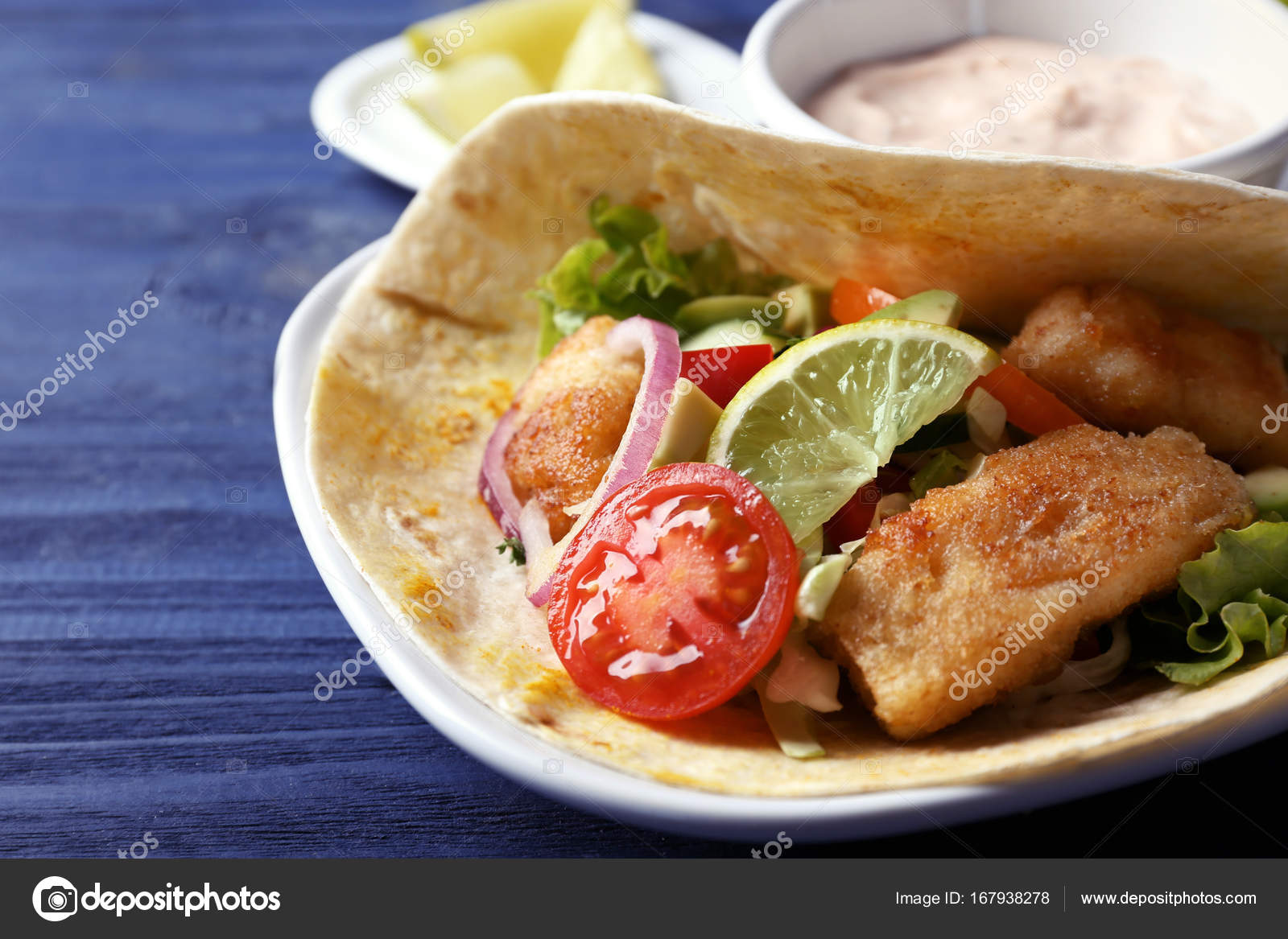 Fish taco and sauce Stock Photo by ©belchonock 167938278
