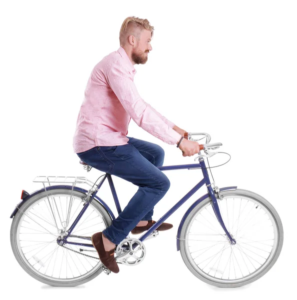 Junger schöner Mann mit Fahrrad auf weißem Hintergrund — Stockfoto