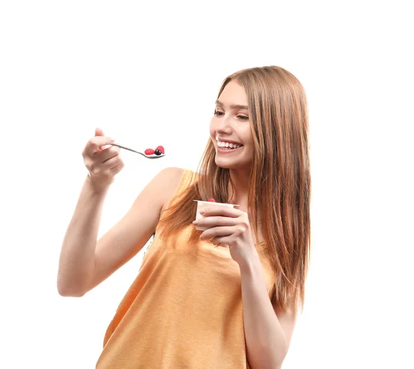 Woman eating yogurt — Stock Photo, Image